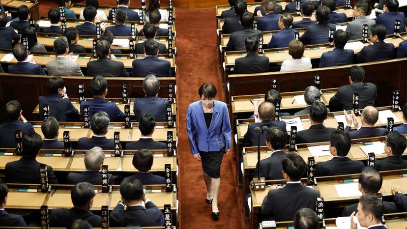 Sanae Takaichi, leader of the ruling Liberal Democratic Party, walks after casting a vote in an election to choose Japan's next prime minister at the Lower House of Parliament in Tokyo