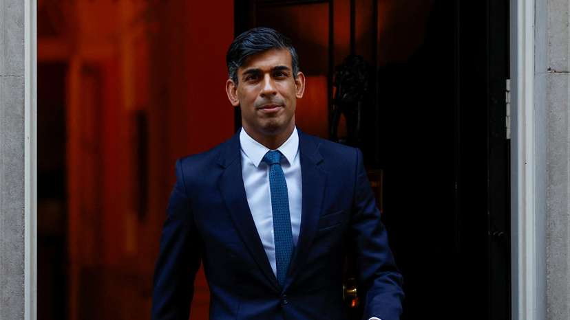 Britain's PM Sunak walks outside 10 Downing Street ahead of PMQs, in London