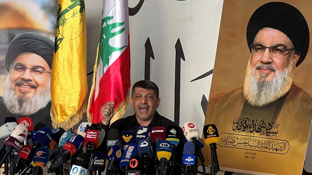 Head of Hezbollah's media office, Afif, speaks during a press conference in Beirut's southern suburbs