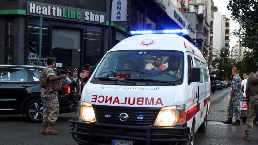 People gather outside a hospital, as more than 1,000 people, including Hezbollah fighters and medics, were wounded on Tuesday when the pagers they use to communicate exploded across Lebanon, according to a security source, in Beirut