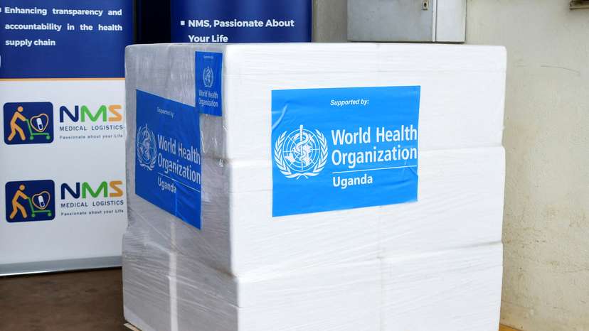 A consignment of 1,200 doses is placed on a pallet at the National Medical Stores (NMS) in Entebbe