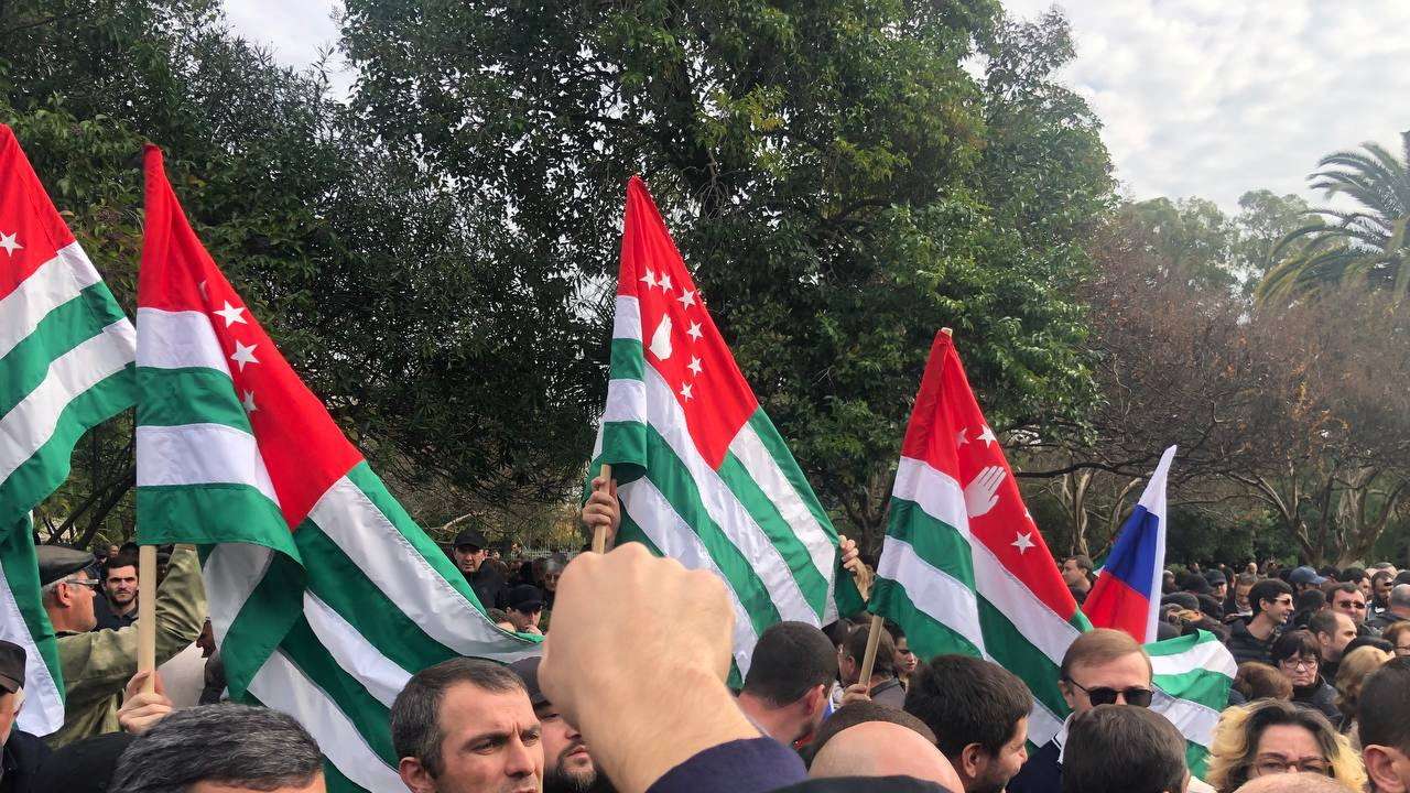 Protesters rally outside the parliament building in the capital of Georgia's breakaway region of Abkhazia