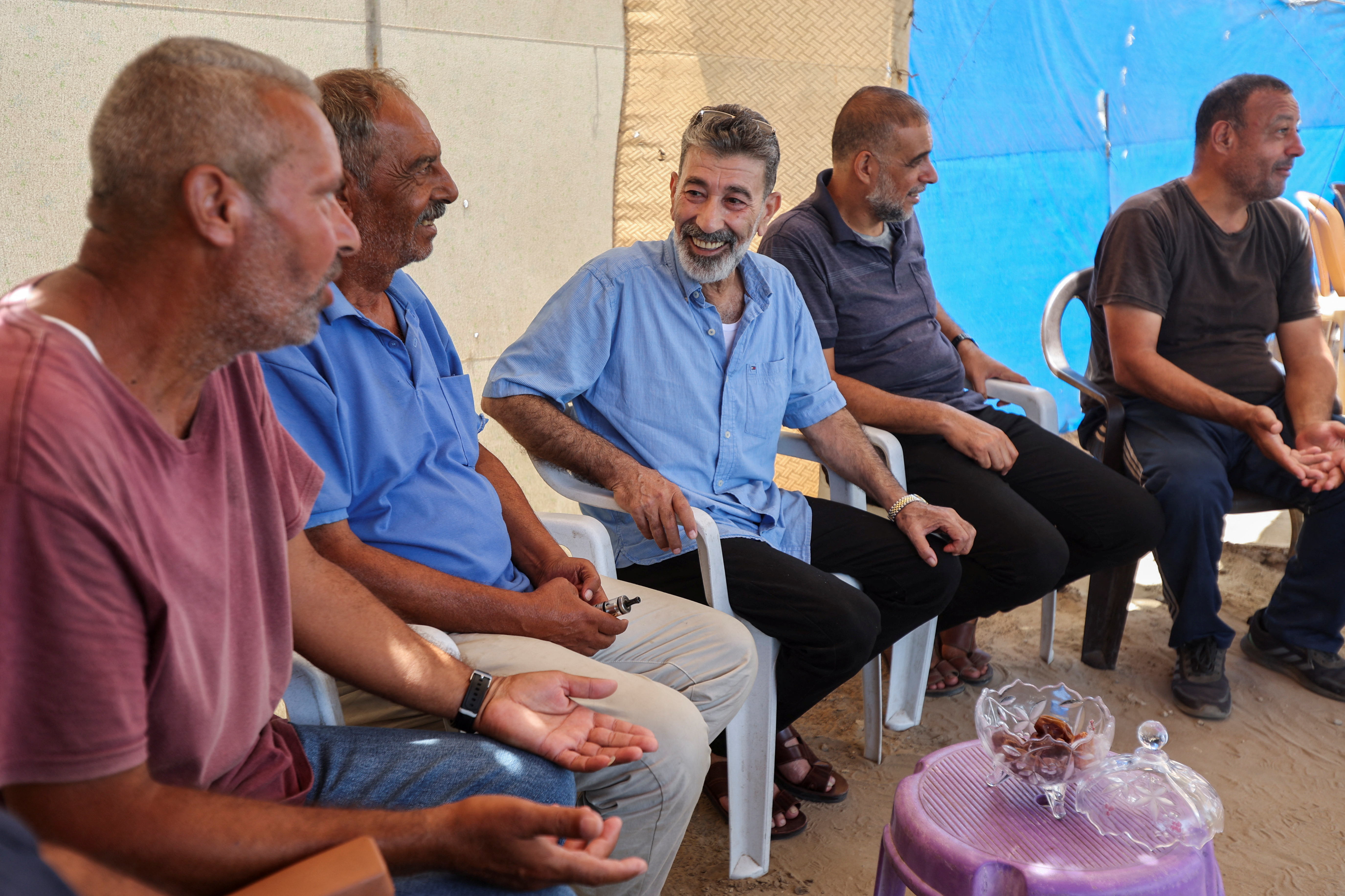 Youssef Mikdad, a former Palestinian prisoner recently released by Israel, meets with people, in Deir Al-Balah in central Gaza Strip