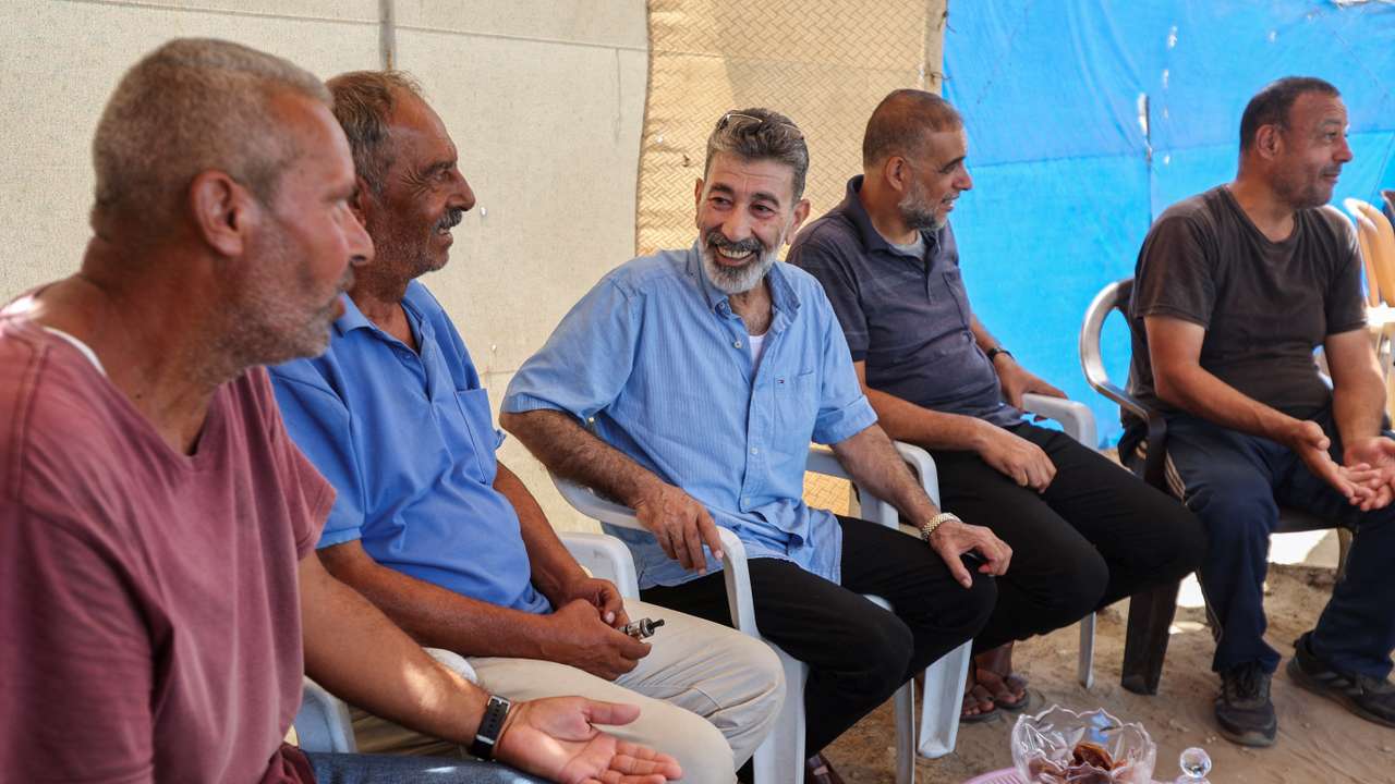 Youssef Mikdad, a former Palestinian prisoner recently released by Israel, meets with people, in Deir Al-Balah in central Gaza Strip