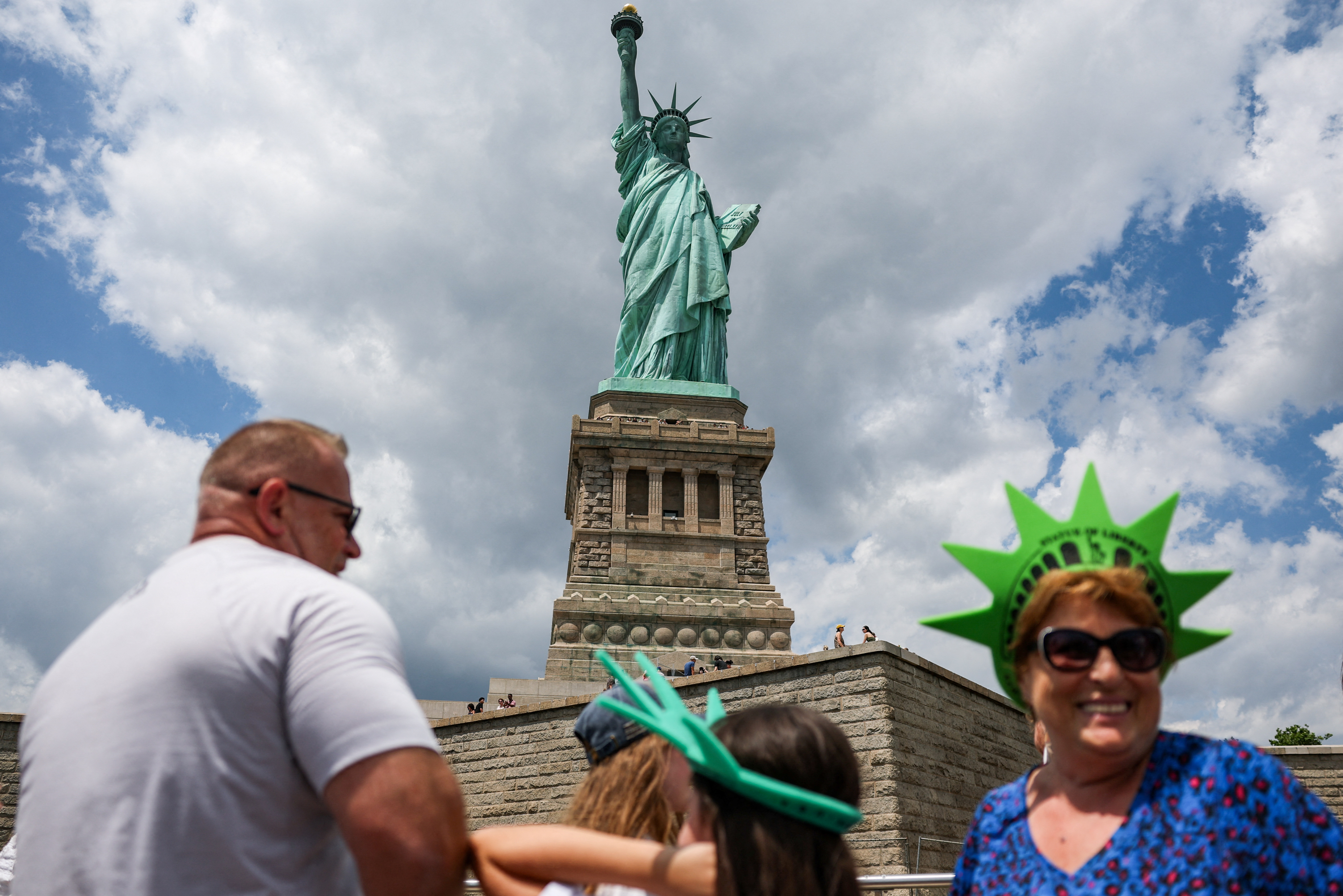 People visit the Statue of Liberty in New York