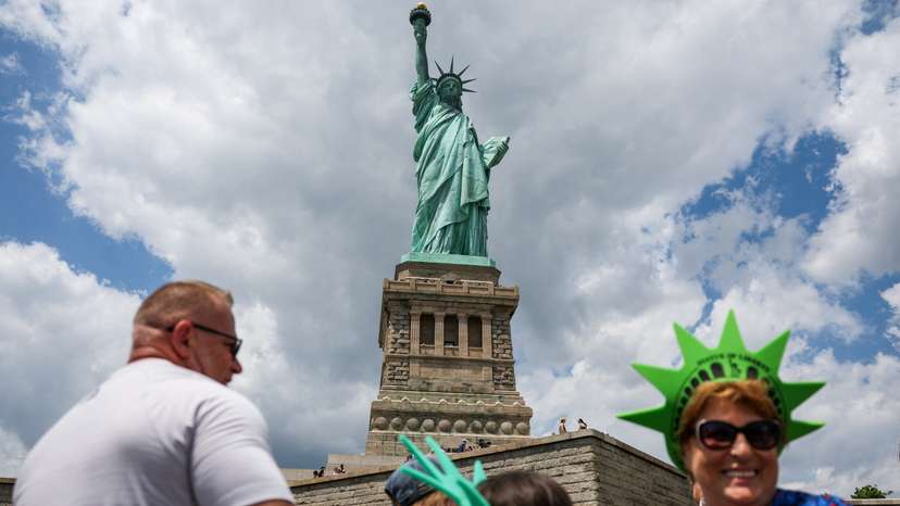 People visit the Statue of Liberty in New York