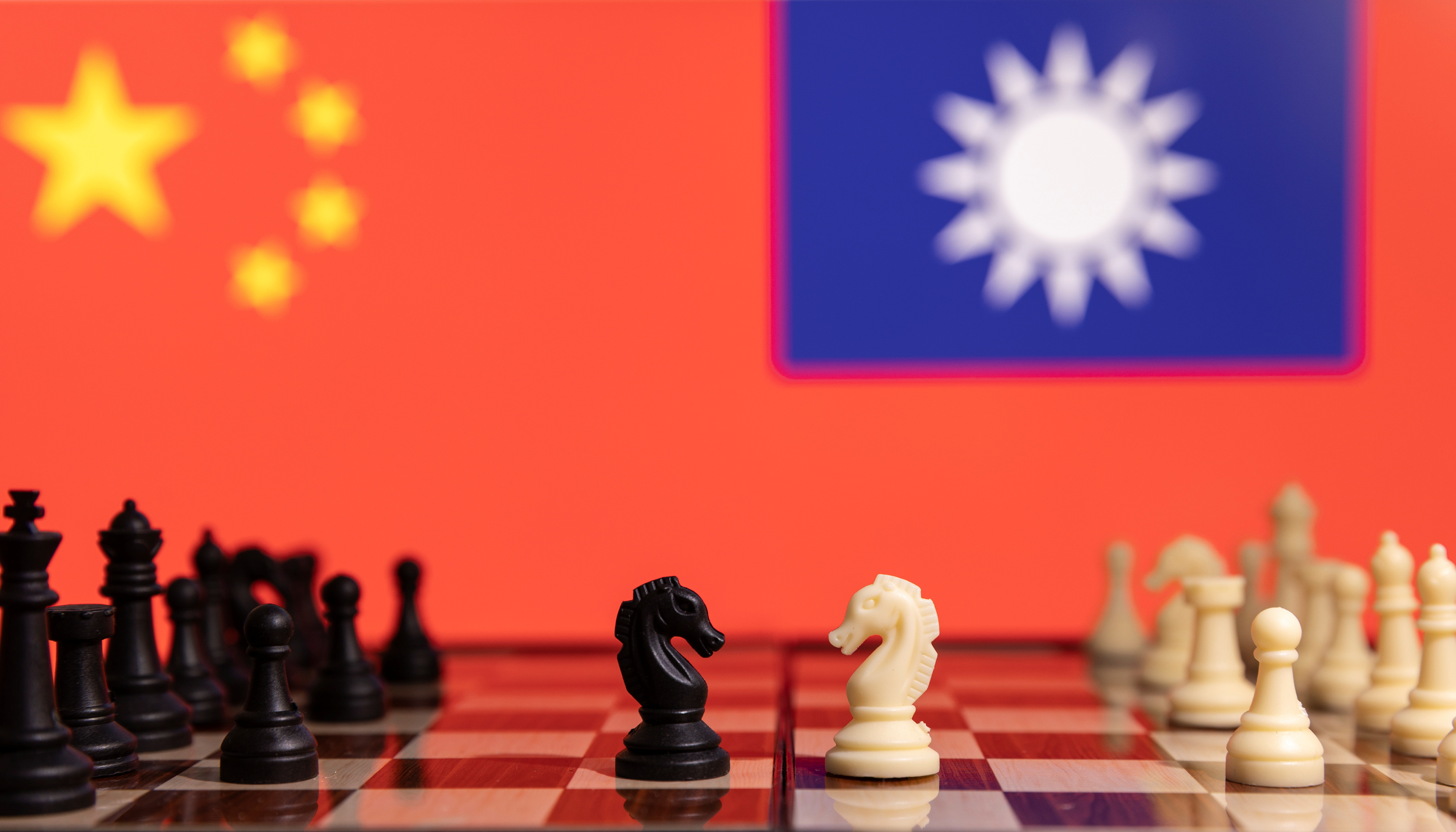 Illustration shows China and Taiwan's flags