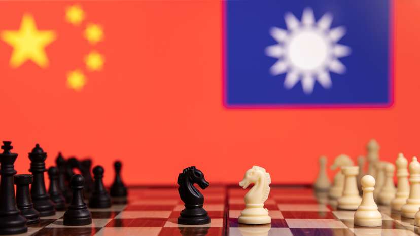 Illustration shows China and Taiwan's flags