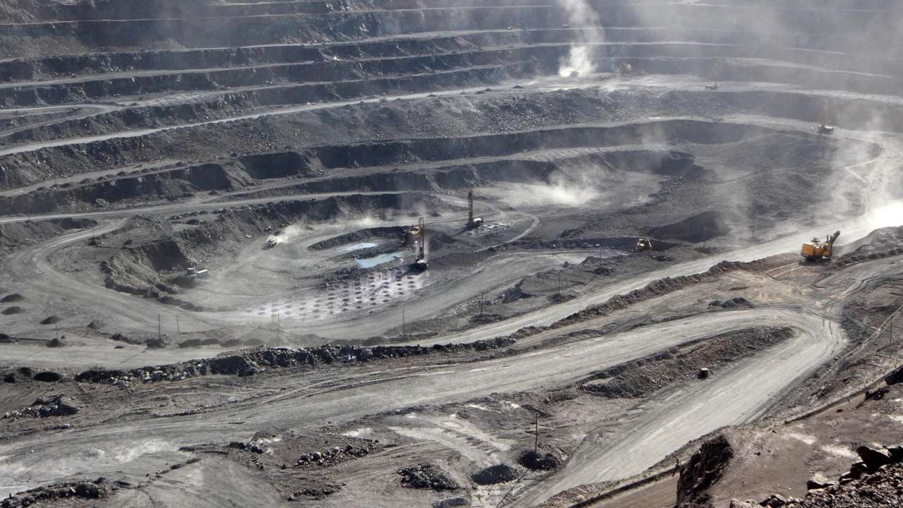 FILE PHOTO: Miners are seen at the Bayan Obo mine containing rare earth minerals, in Inner Mongolia