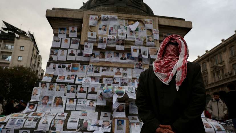 FILE PHOTO: People looking for missing relatives in Damascus