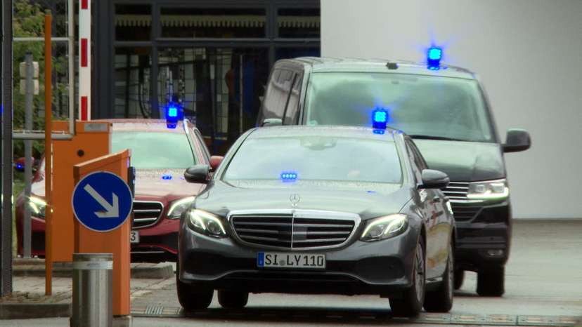 A convoy of police cars leaves the German Federal Public Prosecutor in Karlsruhe