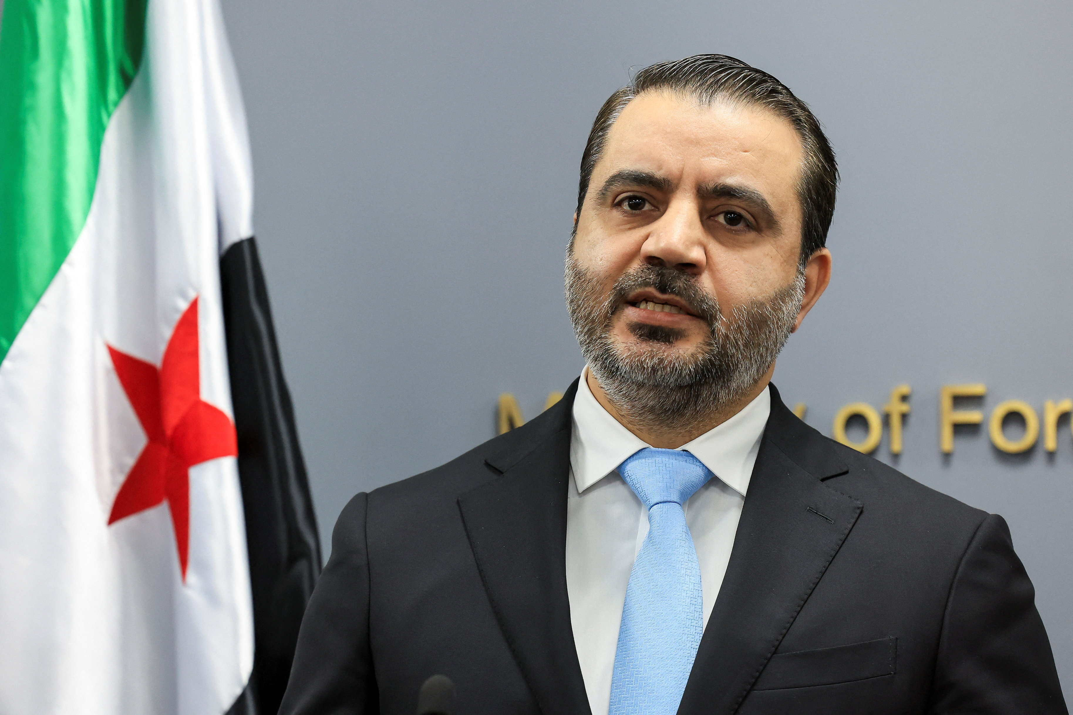 Syrian Foreign Minister Asaad Al-Shibani attends a press conference at the Lebanese foreign ministry, in Beirut