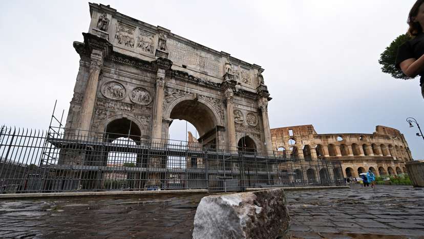 Fragments of Constantine's Arch lie on the ground after lightning struck it during a storm in Rome