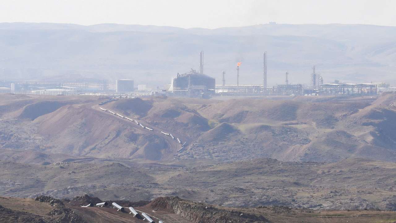 FILE PHOTO: The Khor Mor gas field after a rocket attack near Chamchamal, in Sulaymaniyah province, Iraq
