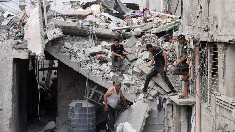 Aftermath of an Israeli strike on a house in Nuseirat in the central Gaza Strip