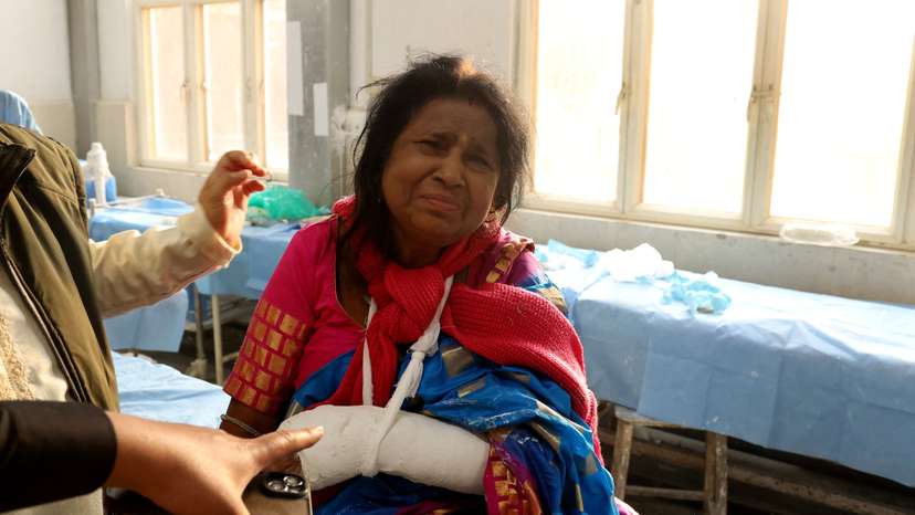 An injured woman receives treatment in a hospital in south Kashmir’s Anantnag