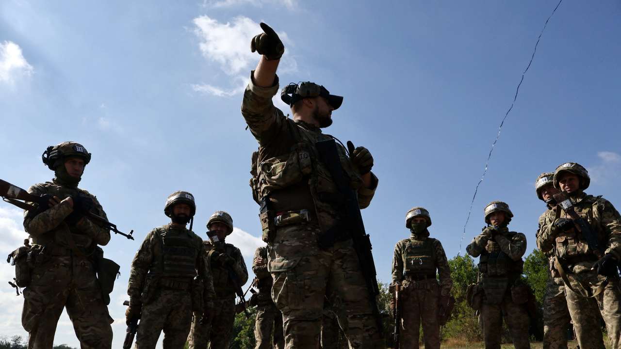 Ukrainian service members attend a military drill near a frontline, in Zaporizhzhia region