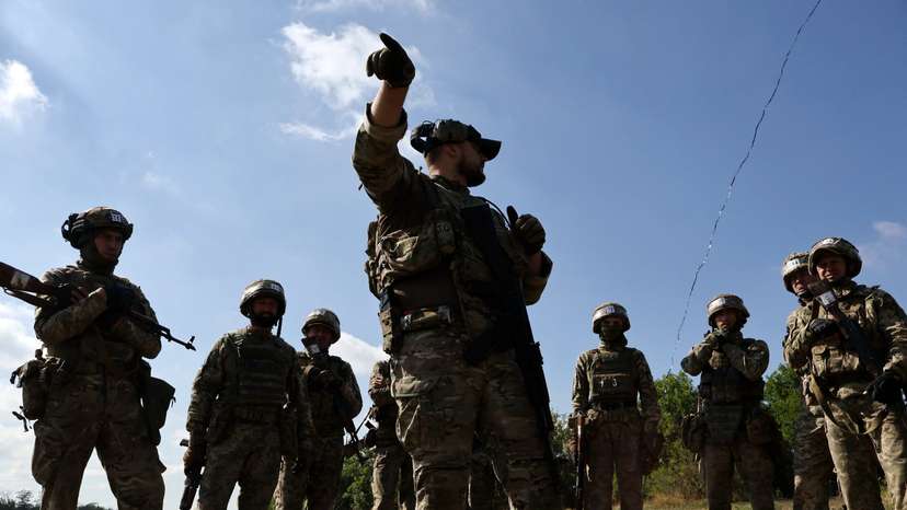 Ukrainian service members attend a military drill near a frontline, in Zaporizhzhia region