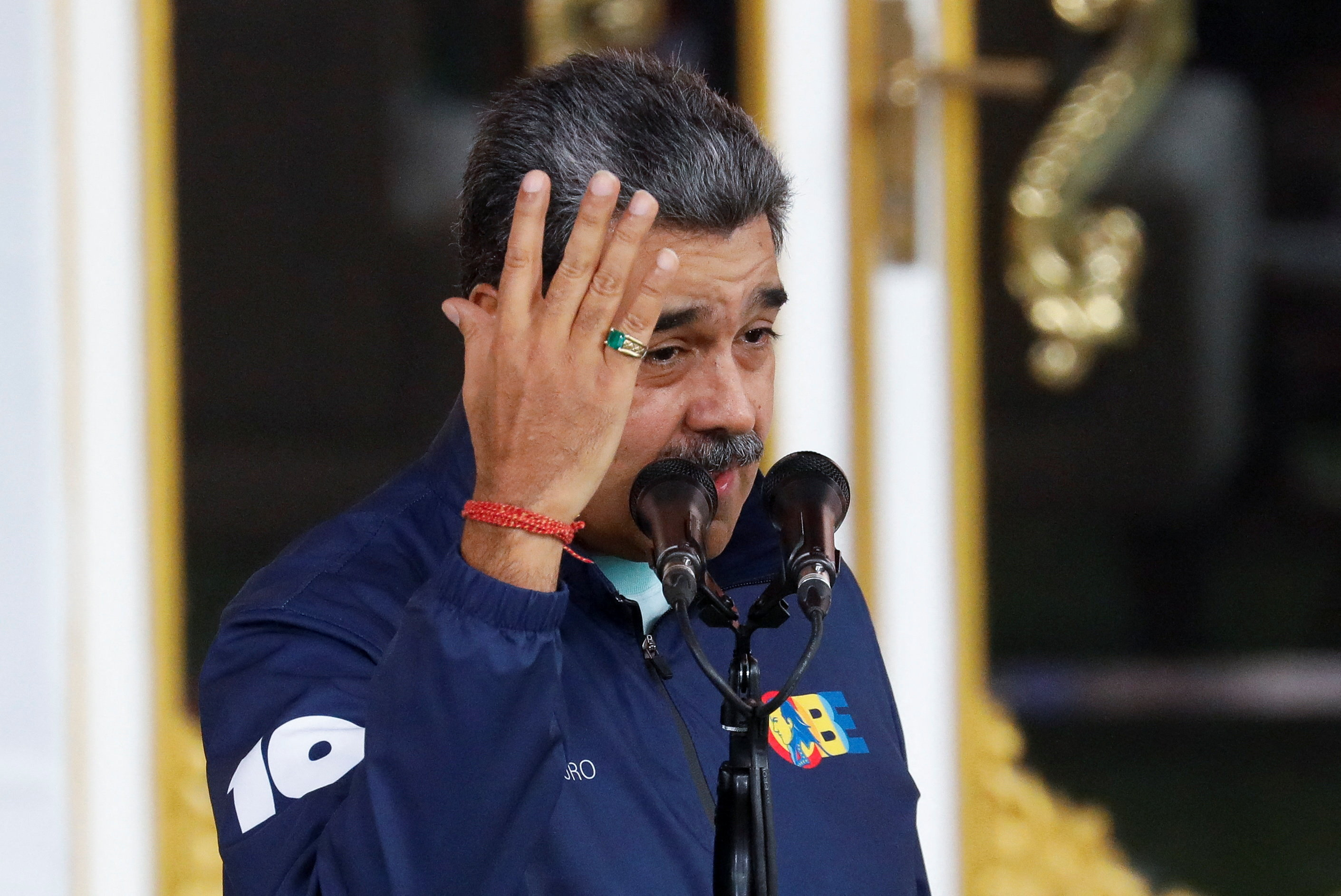 Students march in support of President Nicolas Maduro, in Caracas