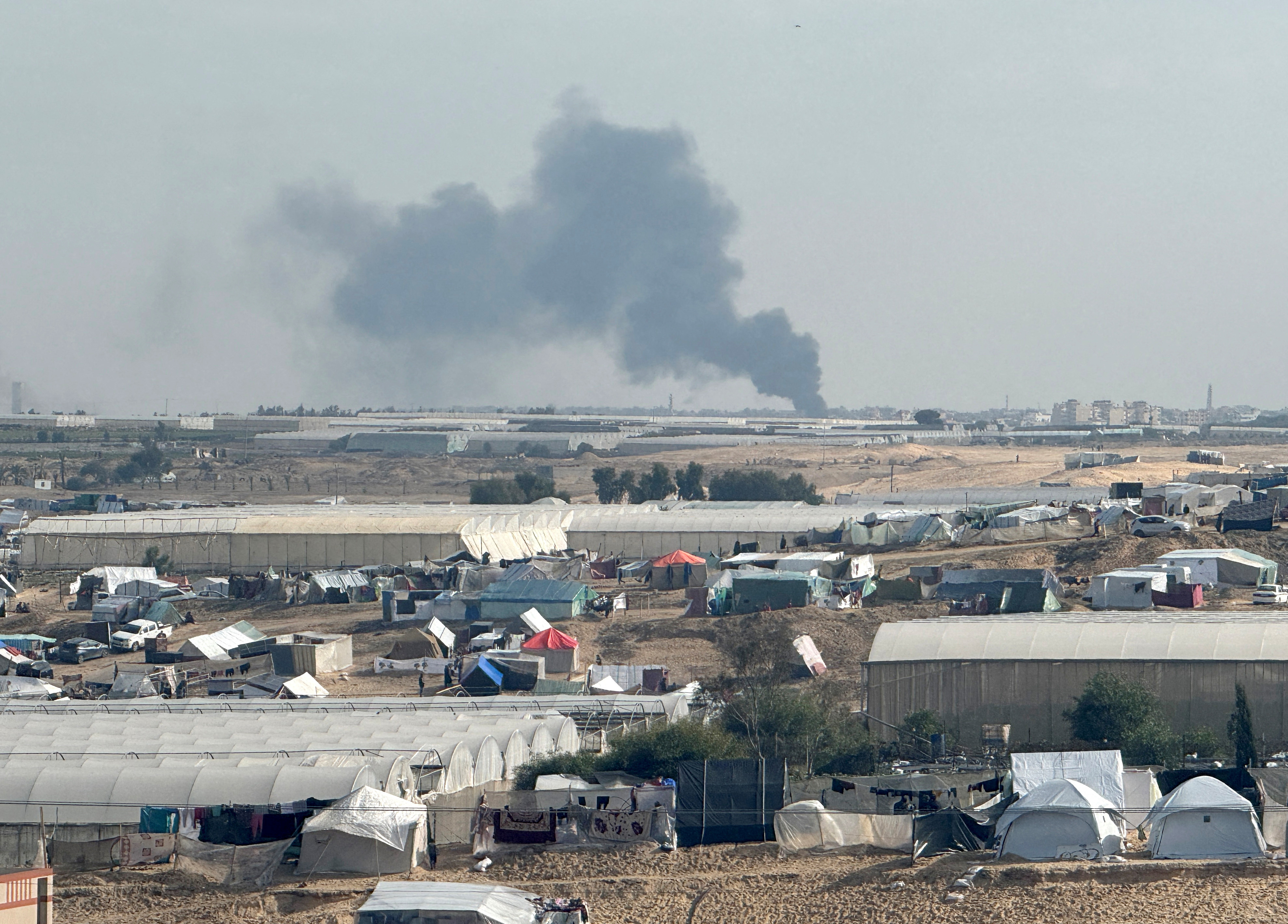 Smoke rises during an Israeli ground operation in Khan Younis