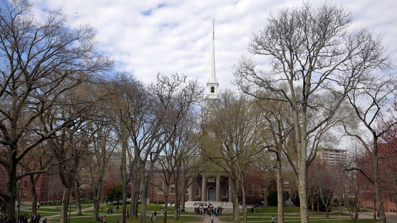 Students walk at the campus of Harvard University in Cambridge, Massachusetts