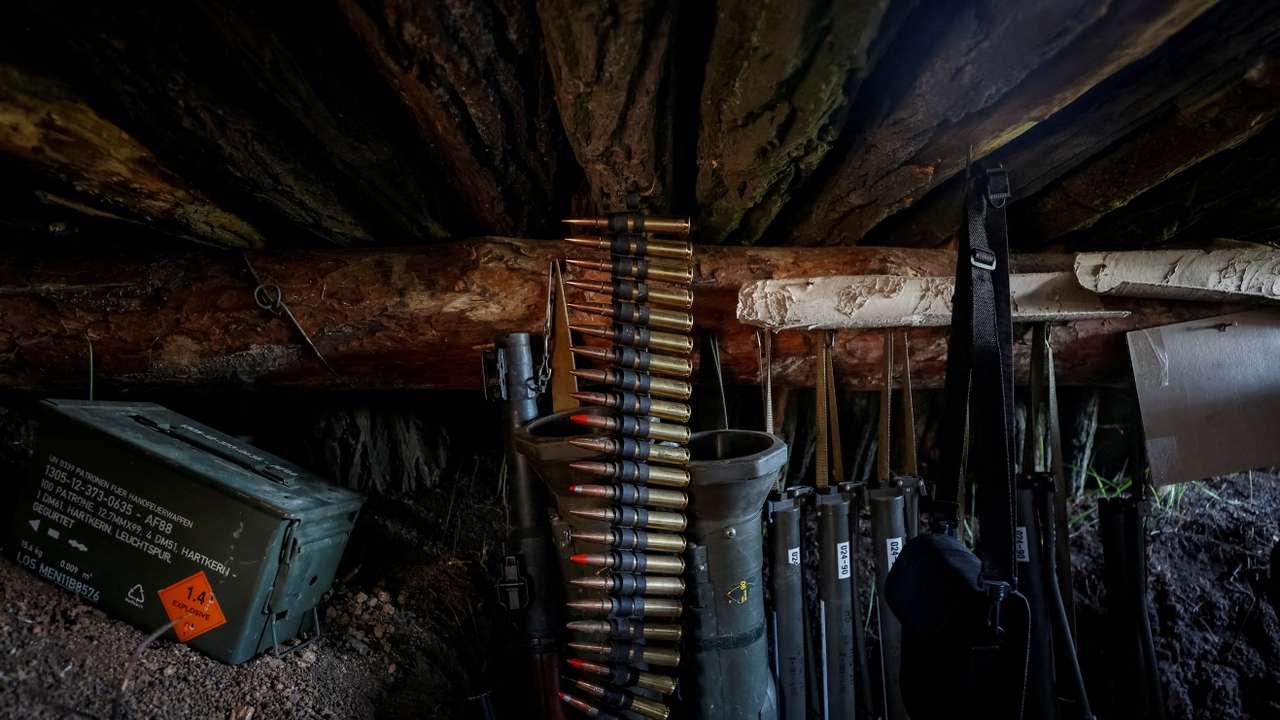 FILE PHOTO: Weapons of Ukrainian service members are seen in a trench at position at a front line in Donetsk region