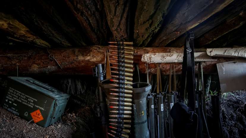 FILE PHOTO: Weapons of Ukrainian service members are seen in a trench at position at a front line in Donetsk region
