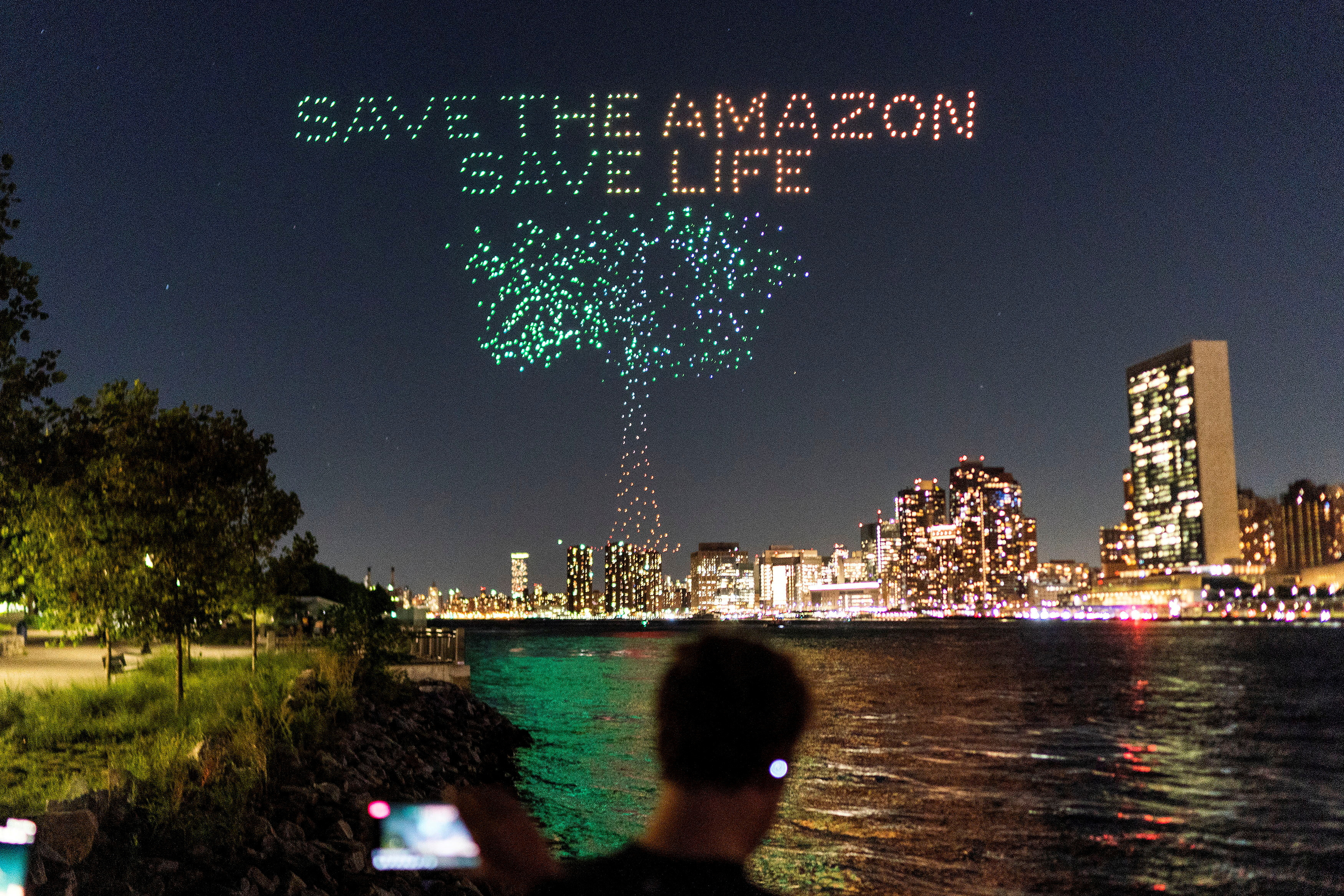 FILE PHOTO: Drones create a 3-D display outside the United Nations Headquarters calling attention to the Amazon rainforest and climate change in New York