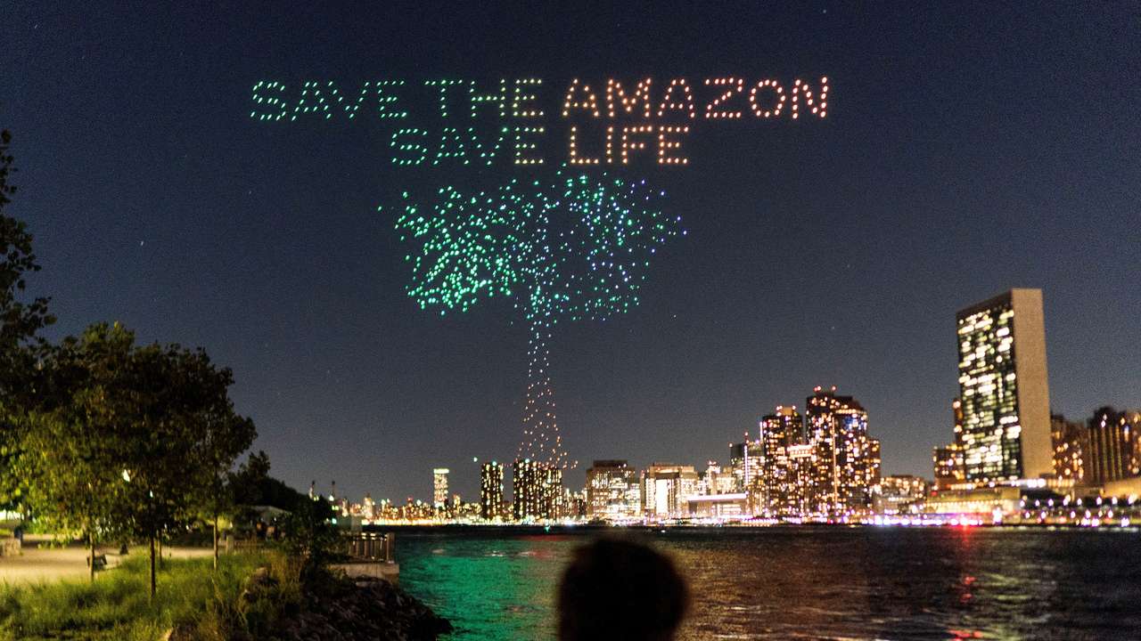 FILE PHOTO: Drones create a 3-D display outside the United Nations Headquarters calling attention to the Amazon rainforest and climate change in New York