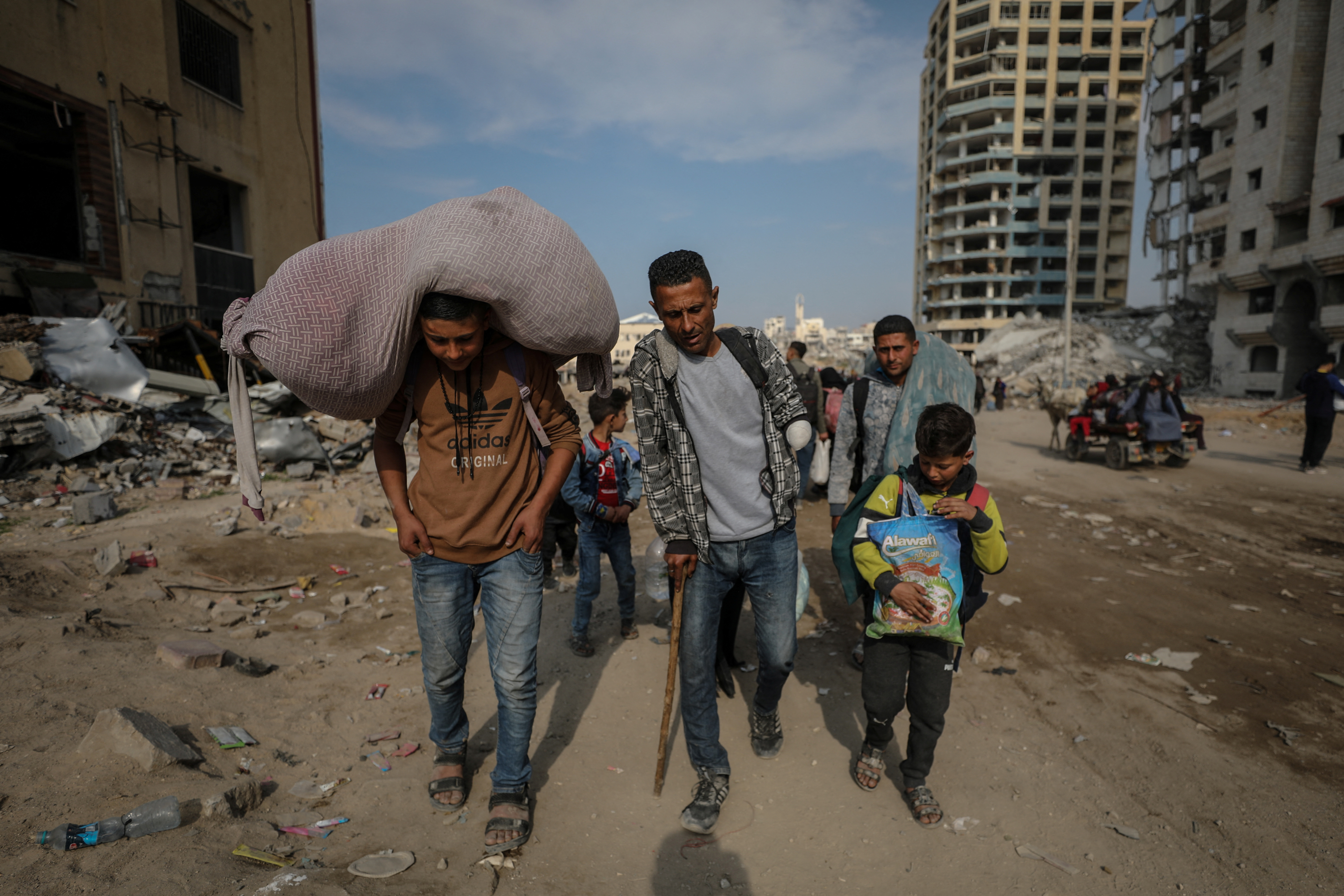 The Wider Image: A Gaza family's journey home to the ruins
