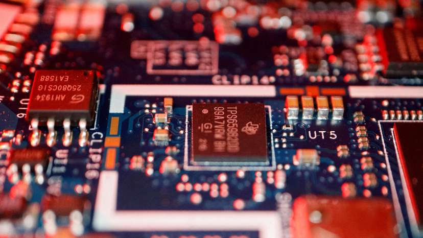 FILE PHOTO: Illustration picture of semiconductor chips on a circuit board