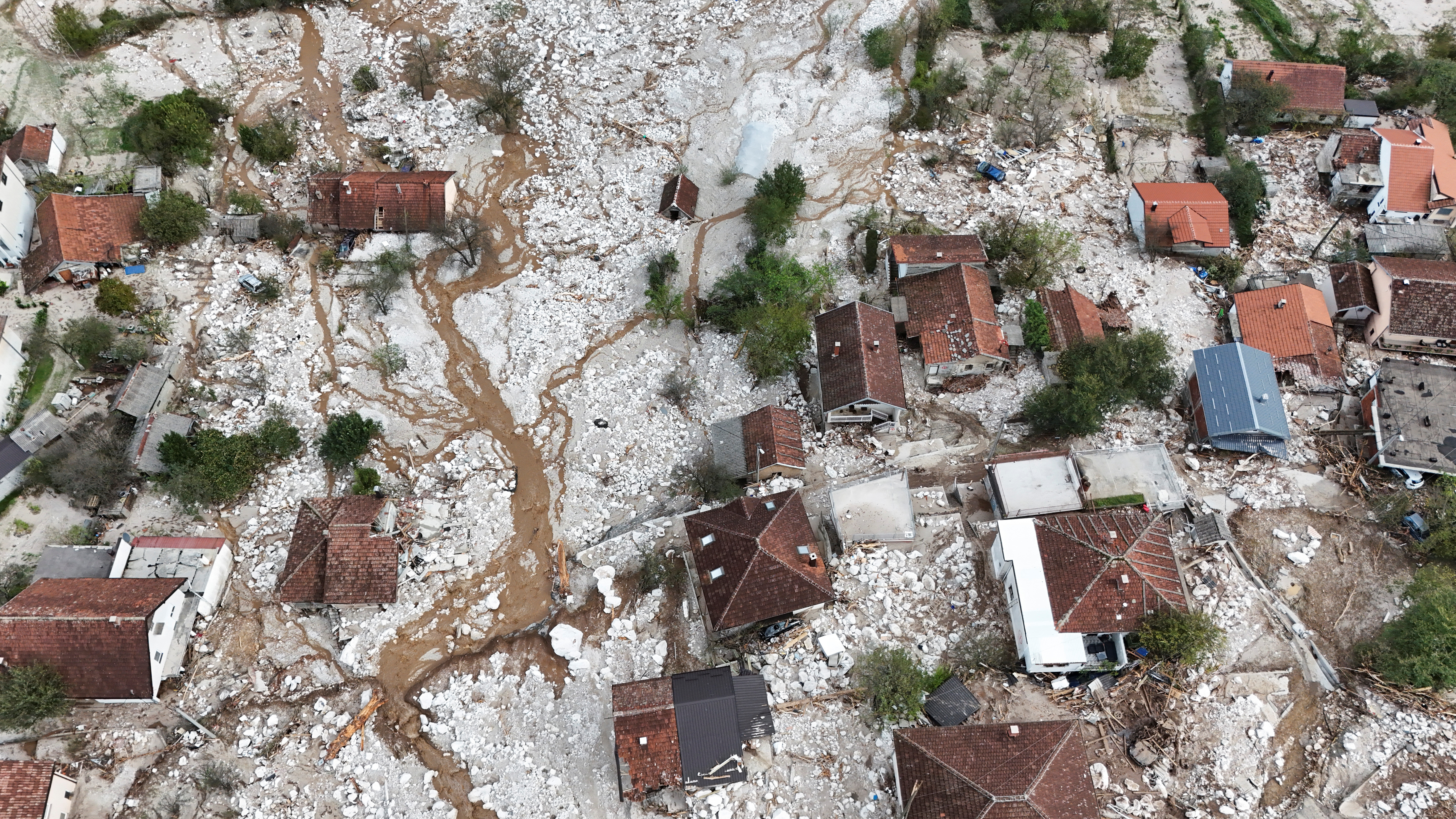 A drone view shows a flooded residential area in Donja Jablanica