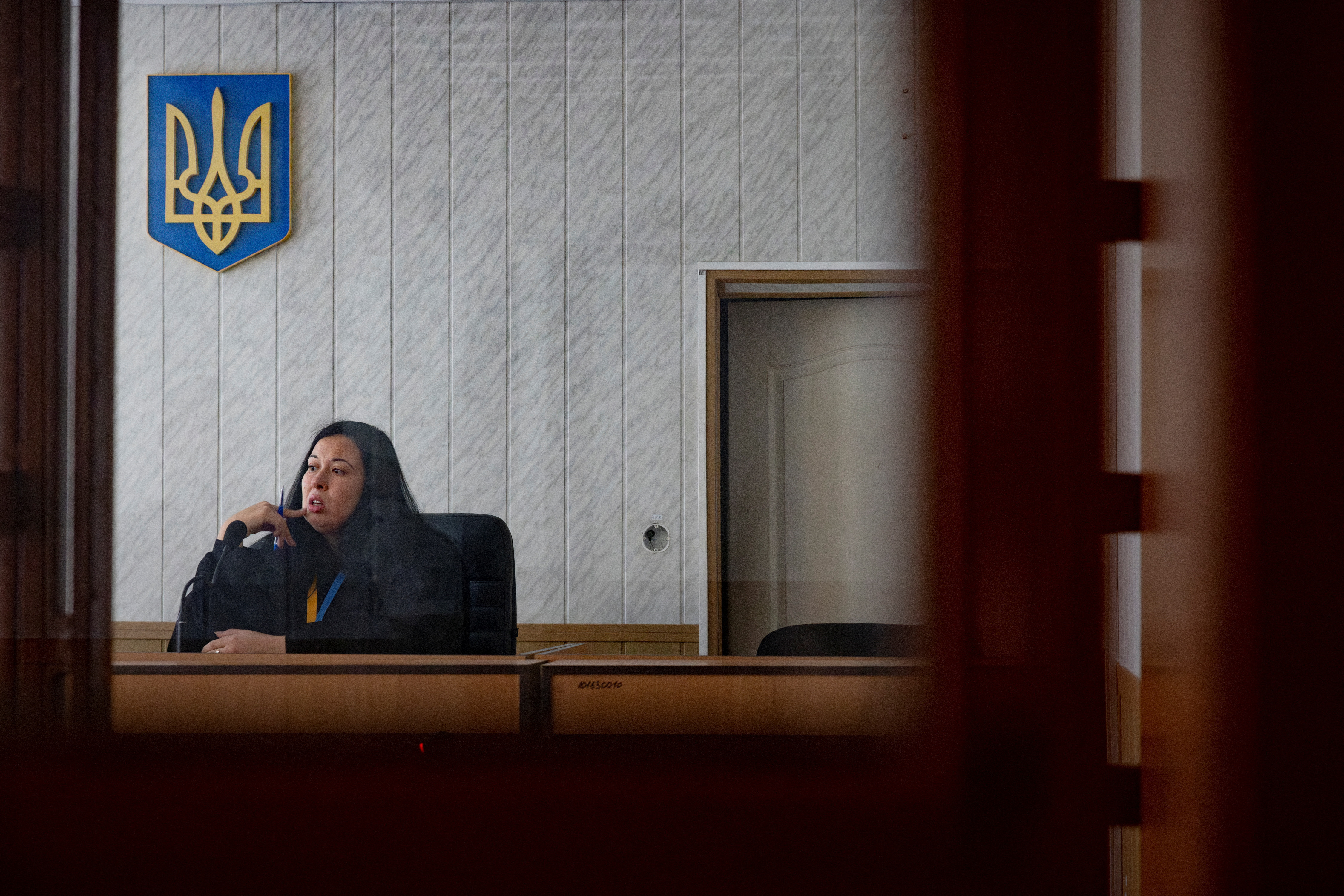 Judge Olha Konoplenko presides over a hearing in the Donetsk region