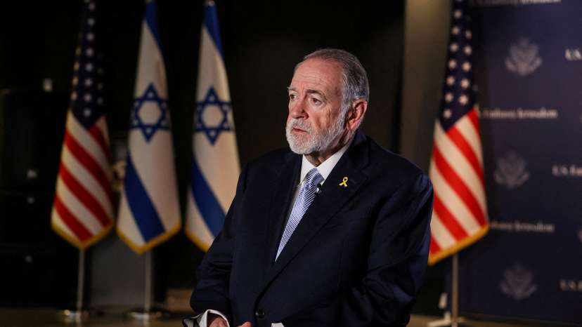 FILE PHOTO: U.S. Ambassador to Israel Mike Huckabee looks on during an interview with Reuters in Jerusalem