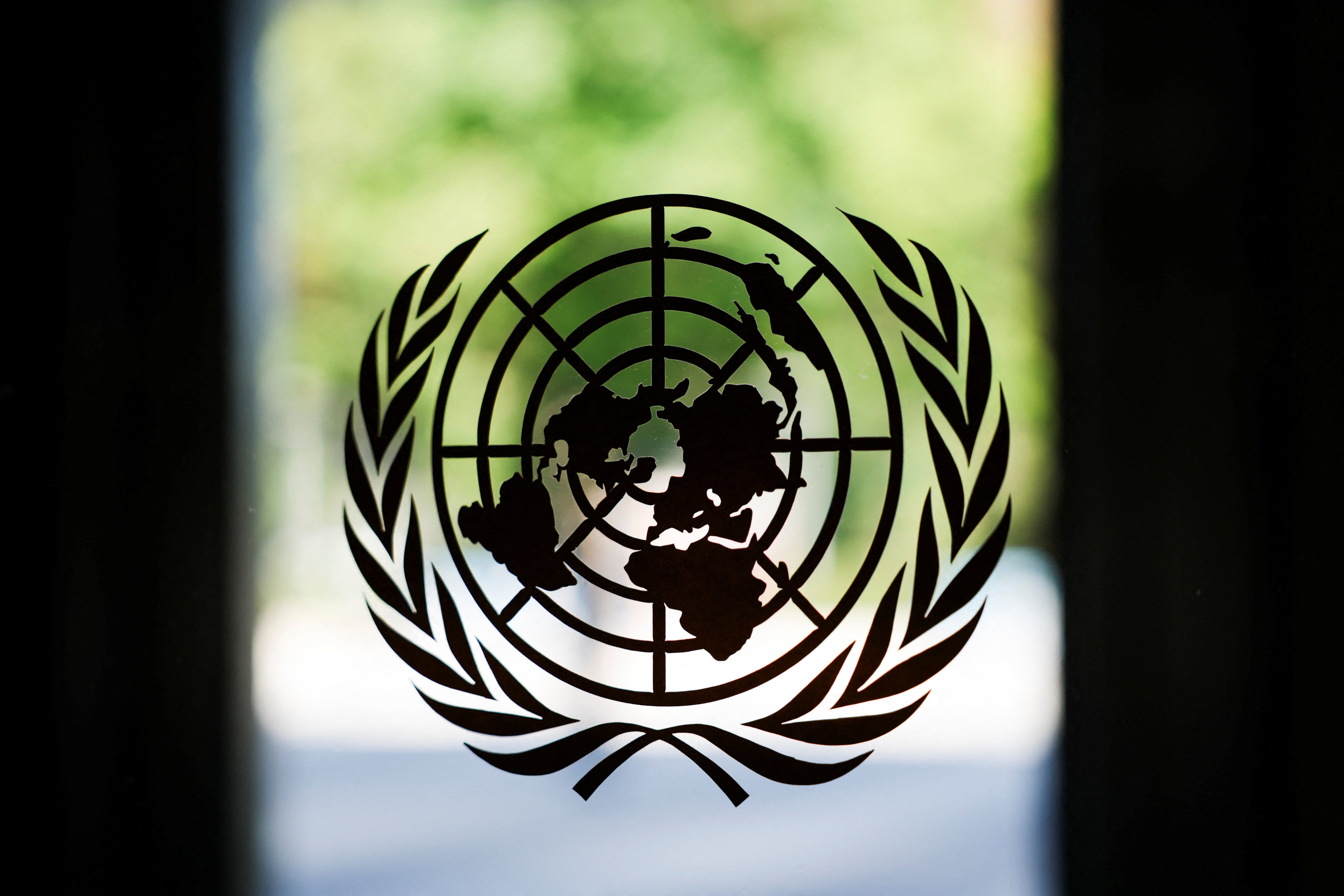 The United Nations logo adorns a window at U.N. headquarters in New York City