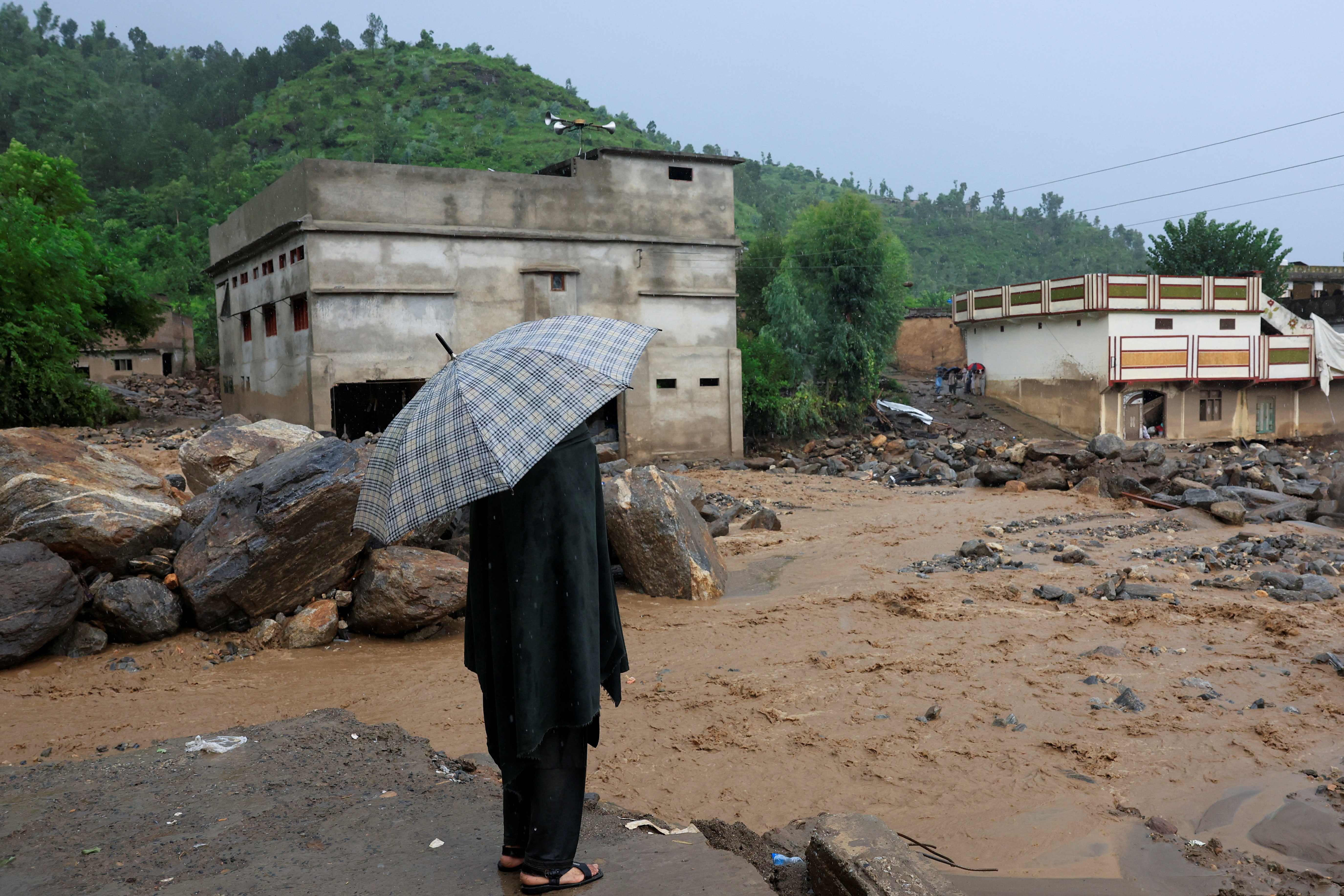 Aftermath of a storm that caused heavy rains and flooding in Bayshonai Kalay in Buner