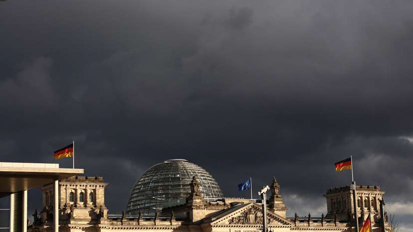FILE PHOTO: Dark clouds over the Bundestag in berlin