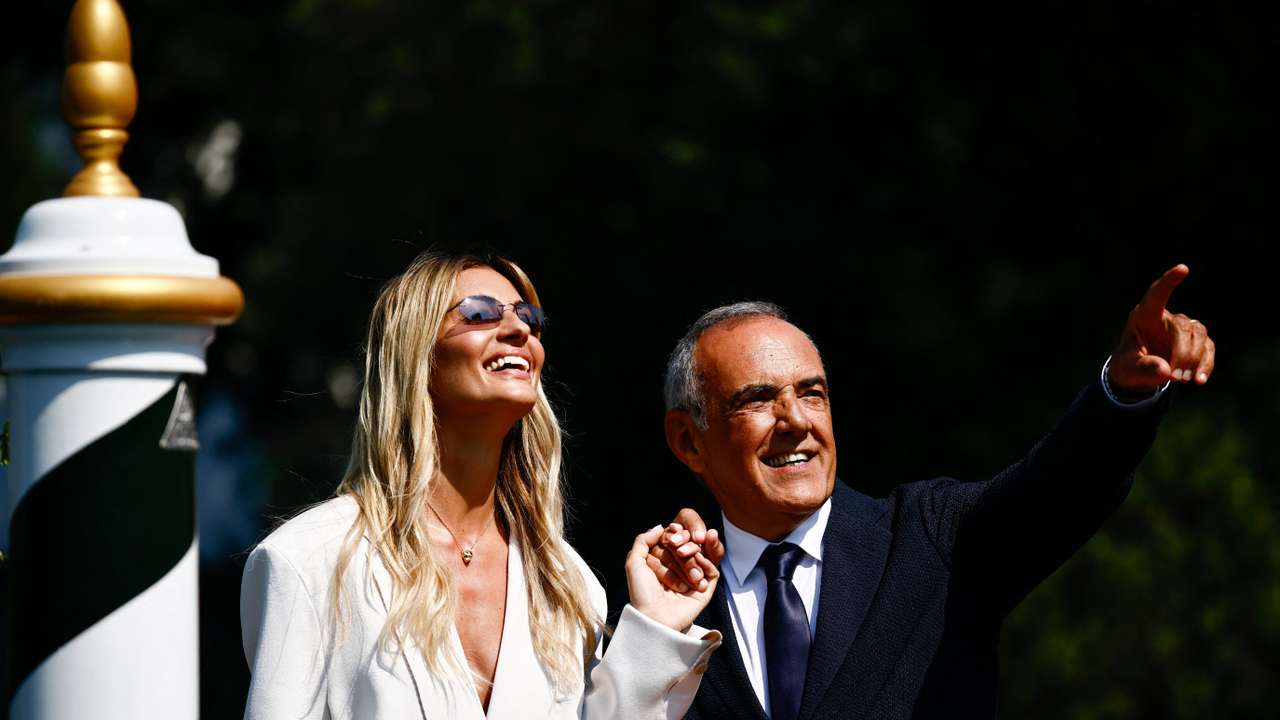 Attendees arrive for the 81st Venice International Film Festival, in Venice