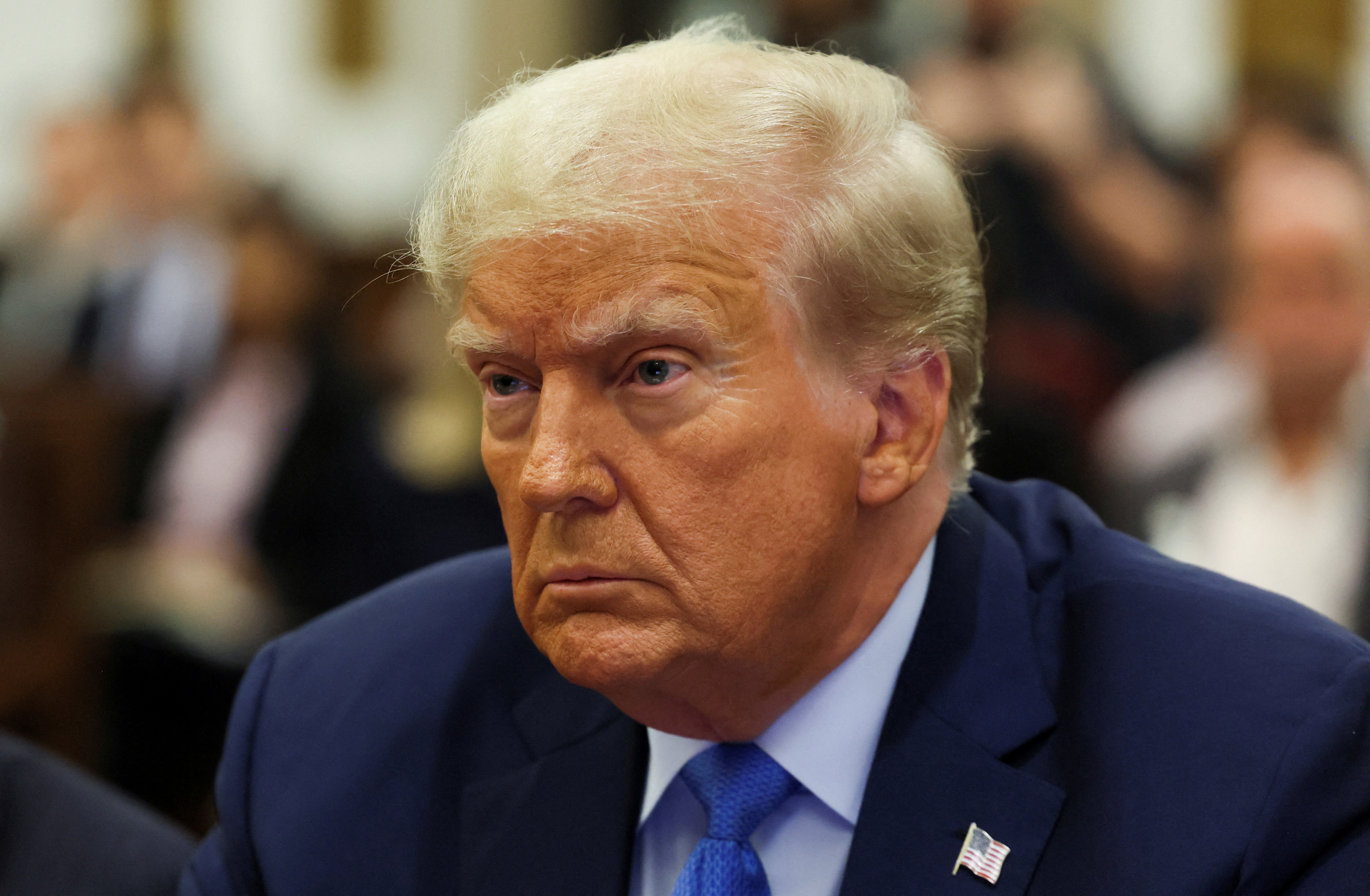 FILE PHOTO: Trump shares poll showing voters associate potential second term with "revenge\