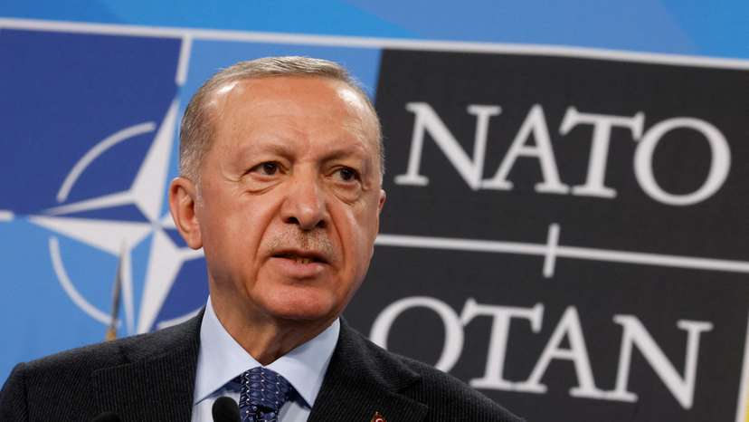 FILE PHOTO: Turkish President Recep Tayyip Erdogan speaks at a press conference during a NATO summit in Madrid,