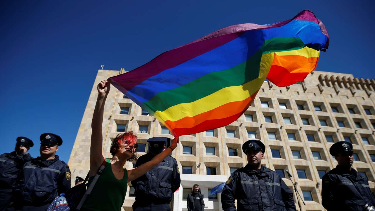 LGBT activist attends a rally against Homophobia and Transphobia in Tbilisi