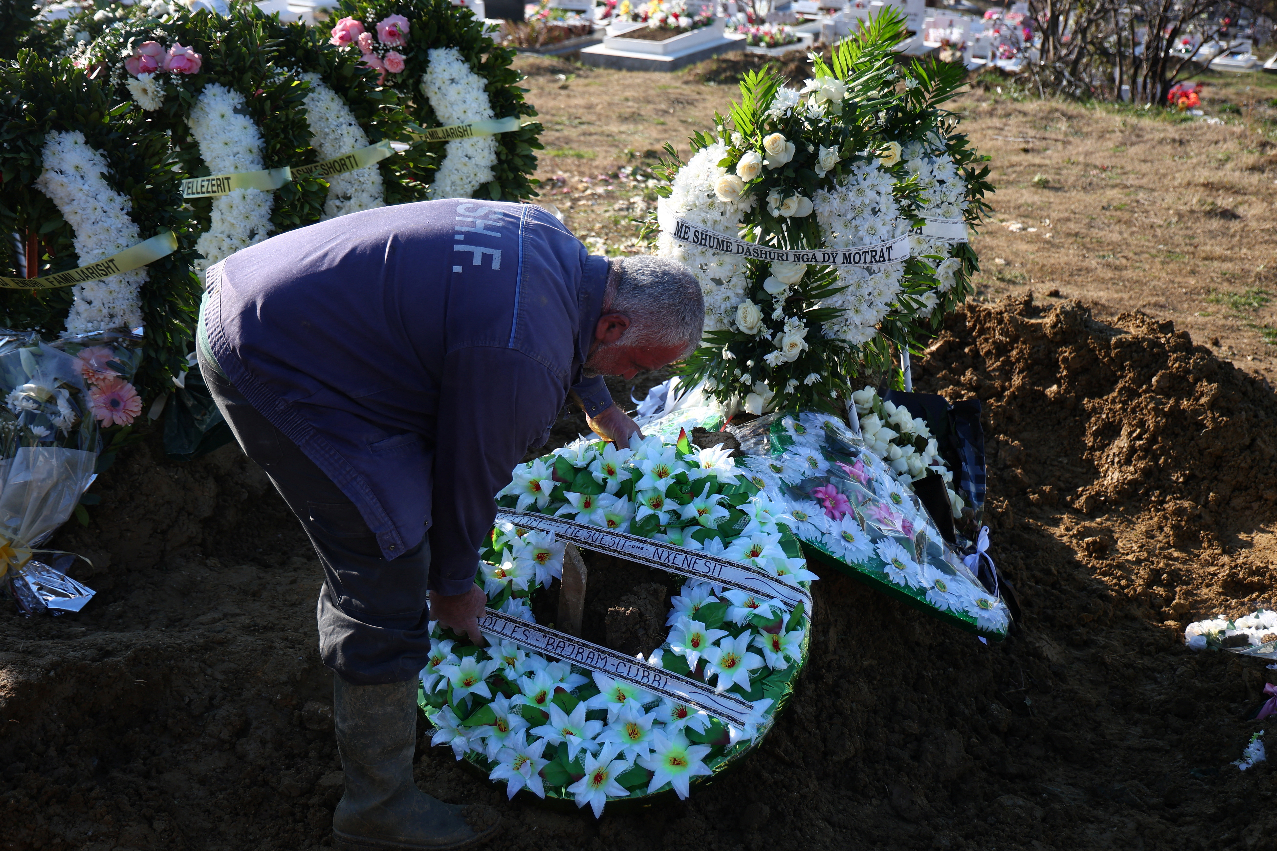 Family and friends take part in the funeral of Leonard Farruku, who died in December on the Bibby Stockholm accommodation barge in the United Kingdom