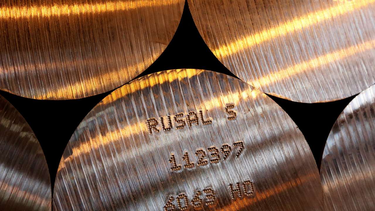 FILE PHOTO: Marked cylindrical aluminium ingots at the foundry shop of the Rusal Sayanogorsk aluminium smelter