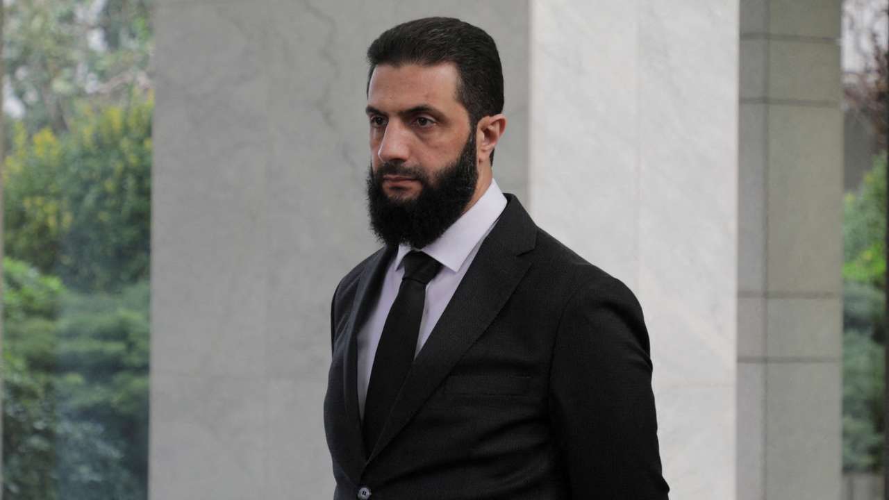 FILE PHOTO: Syria's de facto leader Ahmed al-Sharaa, also known as Abu Mohammed al-Golani waits to welcome the senior Ukrainian delegation led by Ukrainian Foreign Minister Andrii Sybiha, after the ousting of Syria's Bashar al-Assad, in Damascus