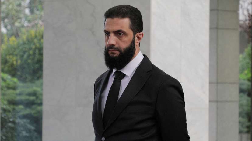 FILE PHOTO: Syria's de facto leader Ahmed al-Sharaa, also known as Abu Mohammed al-Golani waits to welcome the senior Ukrainian delegation led by Ukrainian Foreign Minister Andrii Sybiha, after the ousting of Syria's Bashar al-Assad, in Damascus