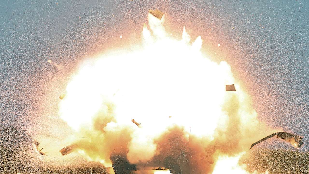 North Korea's Kim Jong Un oversees drone test