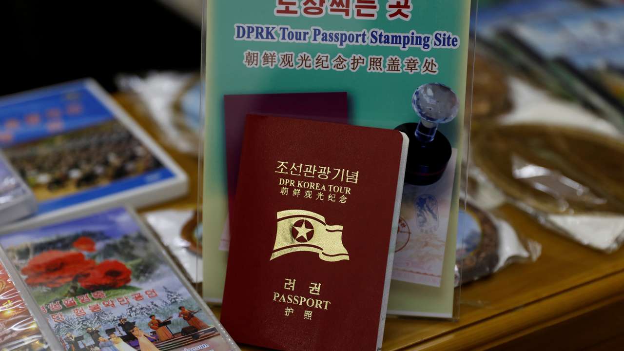 FILE PHOTO: A North Korean tour passport is seen at a souvenir shop at Juche Tower in Pyongyang
