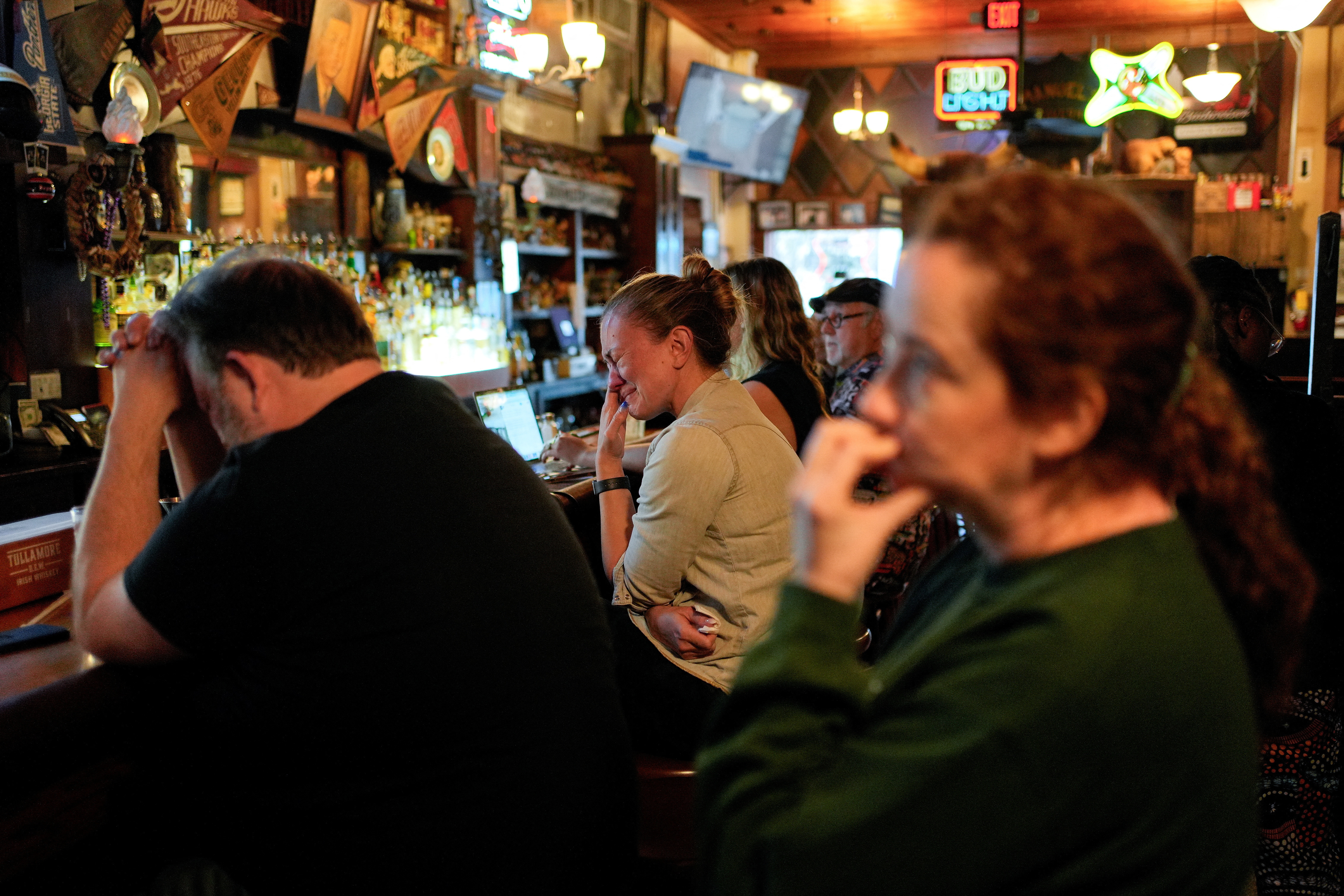 People watch U.S. Vice President Harris' speech, in Atlanta
