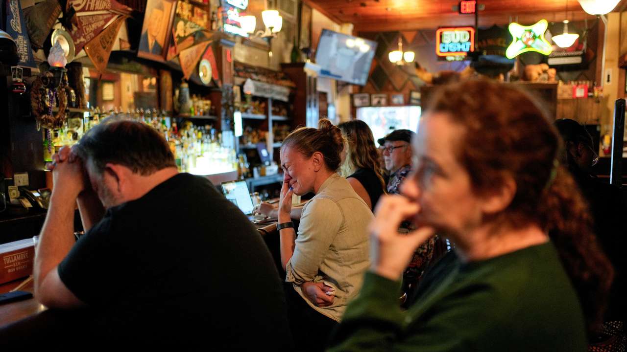 People watch U.S. Vice President Harris' speech, in Atlanta