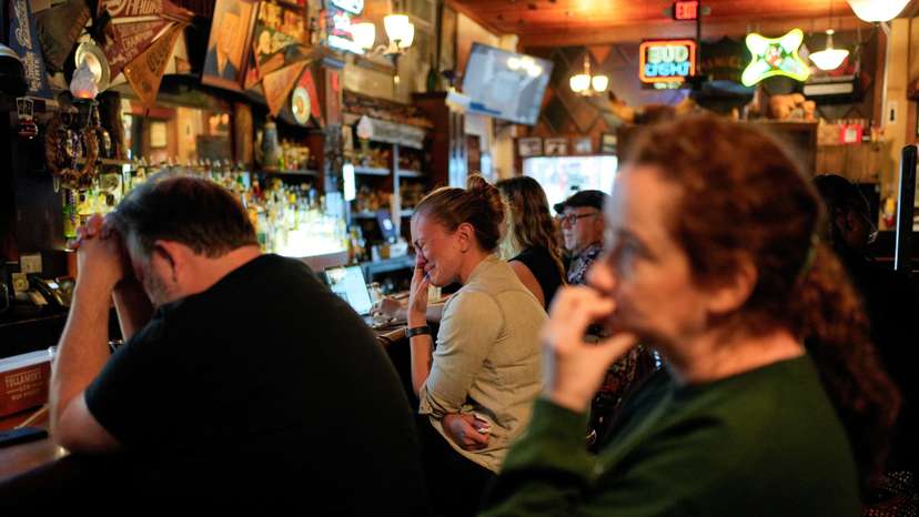 People watch U.S. Vice President Harris' speech, in Atlanta